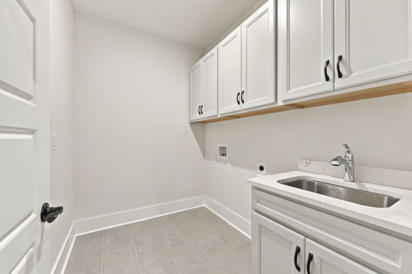 Laundry room with a practical setup for everyday routines.