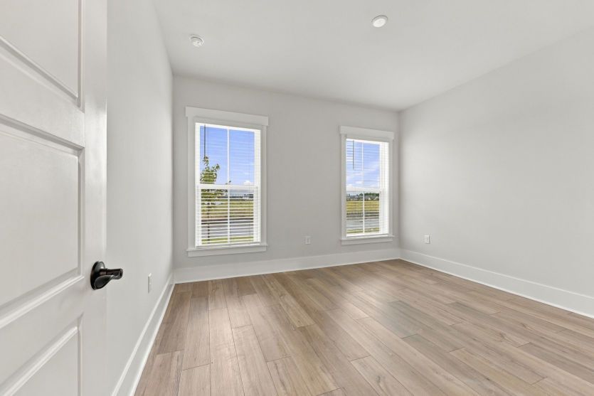 Spacious additional bedroom ideal for family or visitors.
