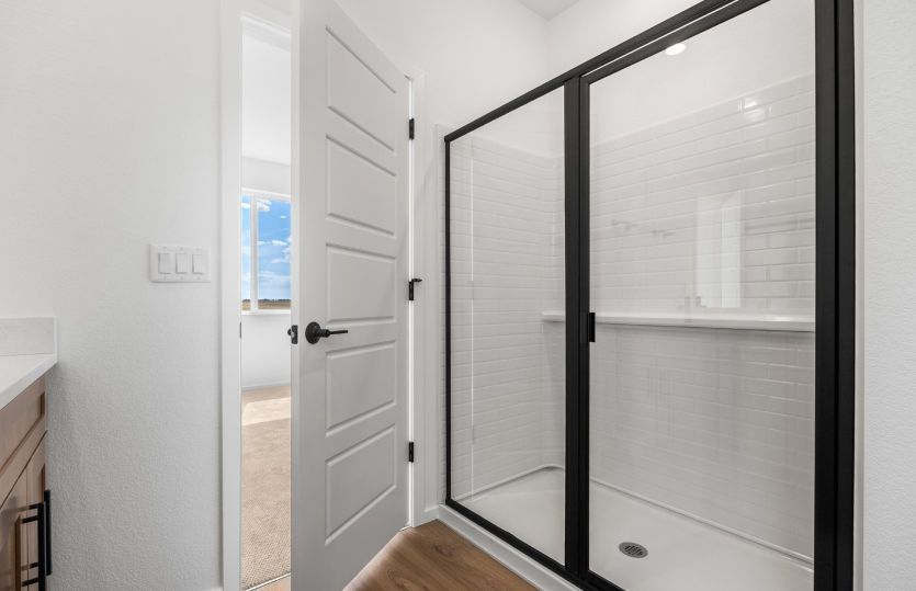 Owner's Suite Bathroom with Tiled Shower