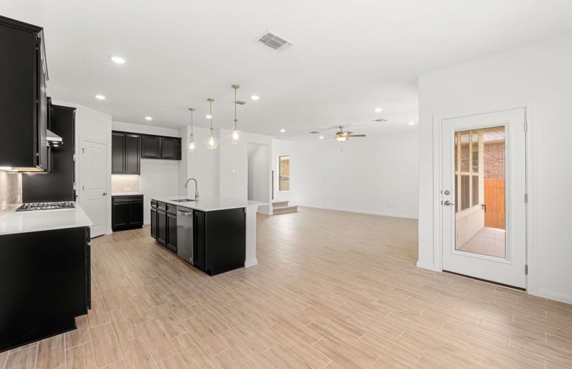 Representational Photo- Dining Space Open to the Kitchen