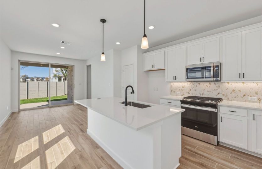 Representational Photo- Kitchen Open to the Gathering Space