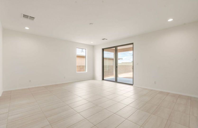 Sliding door provides natural light and access to backyard
