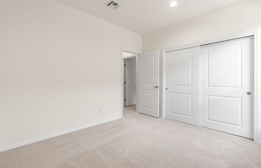 Secondary bedroom with generous closet space