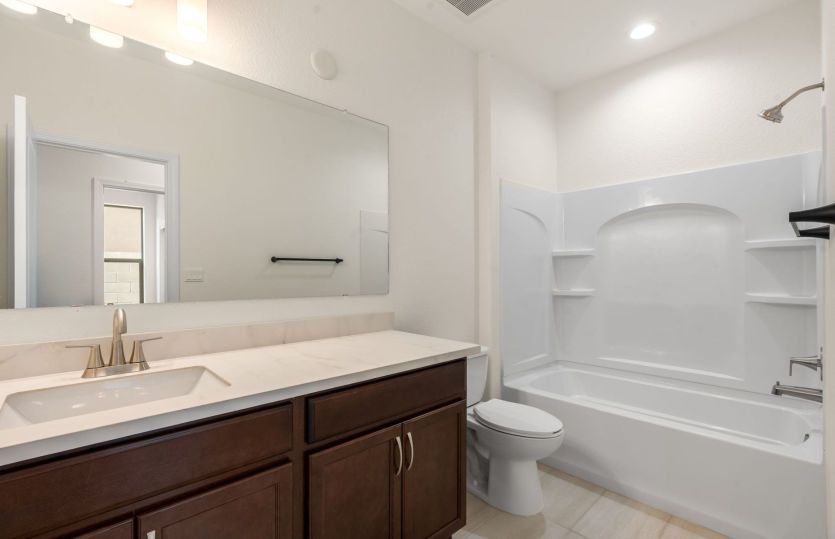 Secondary bathroom with plenty of storage space