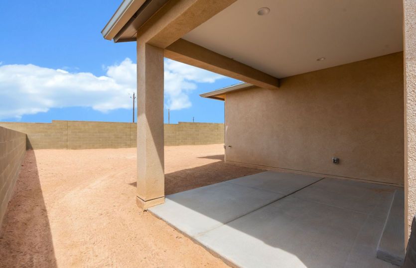 Covered back patio made for effortless outdoor entertaining
