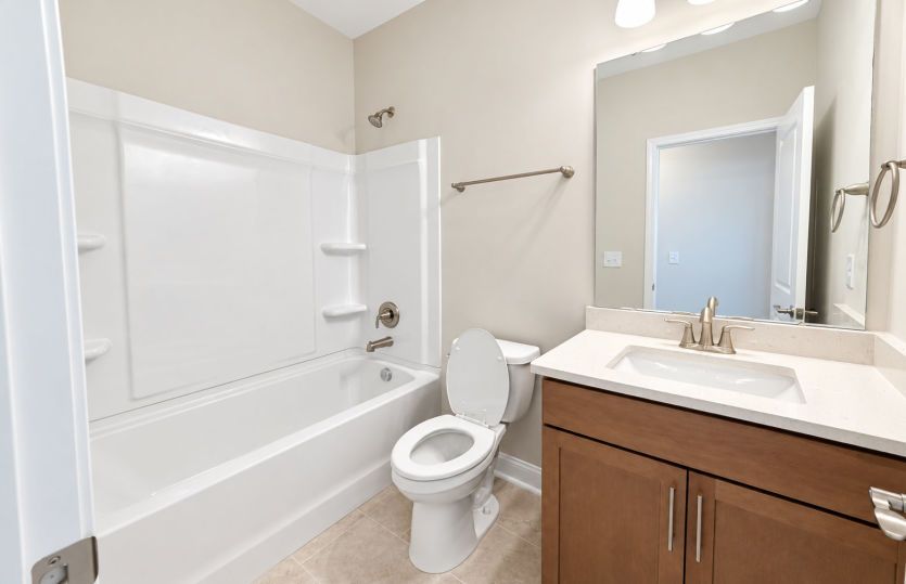 Well-appointed secondary bath with a clean, classic look.