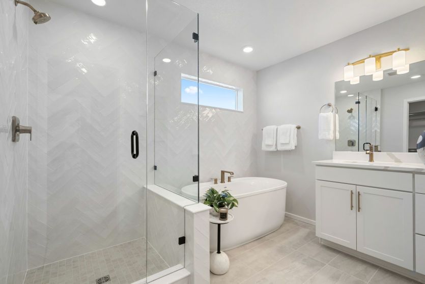 Owner's Suite Bathroom with Freestanding Tub and Tiled Shower