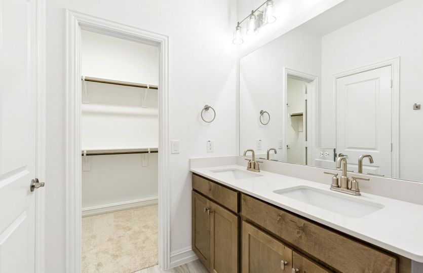 Walk-in closet in primary bath