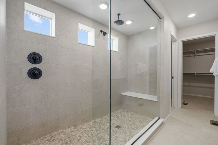 Owner's Suite Bathroom with Tiled Shower