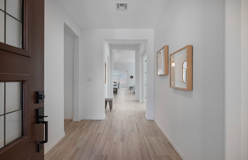 Enter a bright and welcoming foyer
