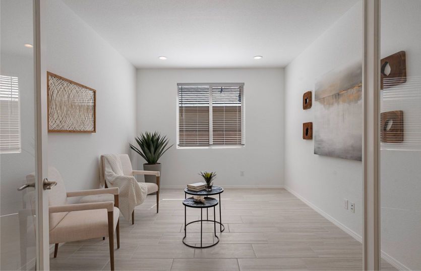 The den provides the perfect place for a home office or workspace