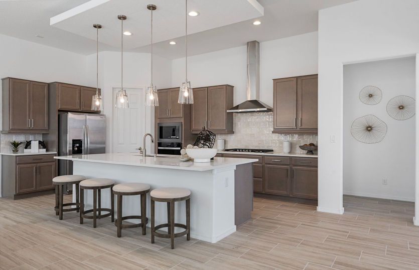 The chef's kitchen upgrade gives this kitchen a luxurious feel