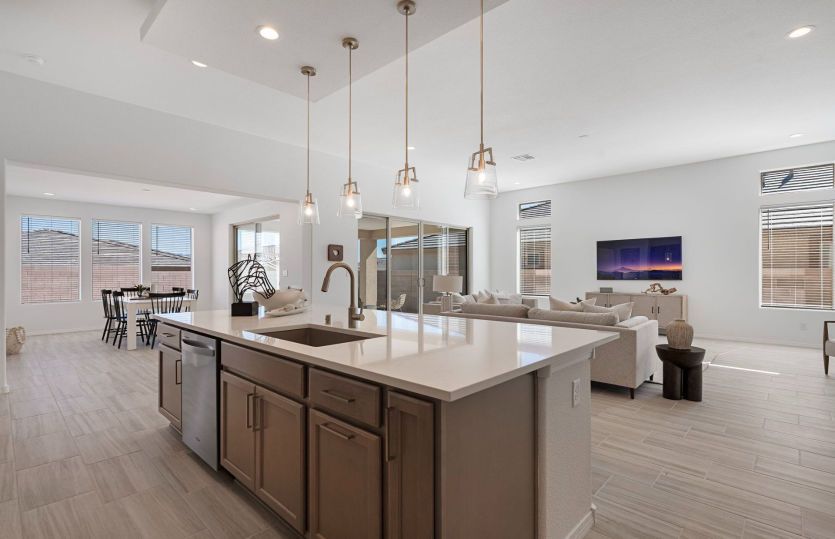 Ceiling accent and pendant lights add to the modern look