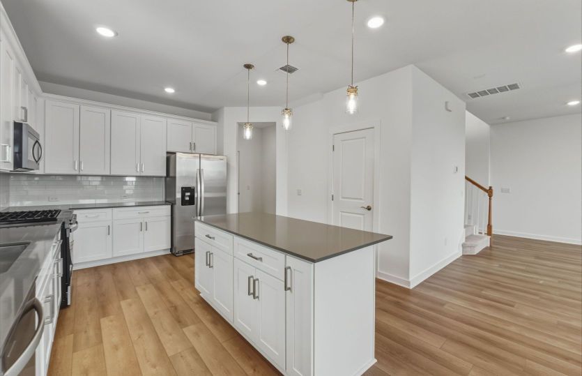 Representational Photo- Kitchen Open to the Gathering Space
