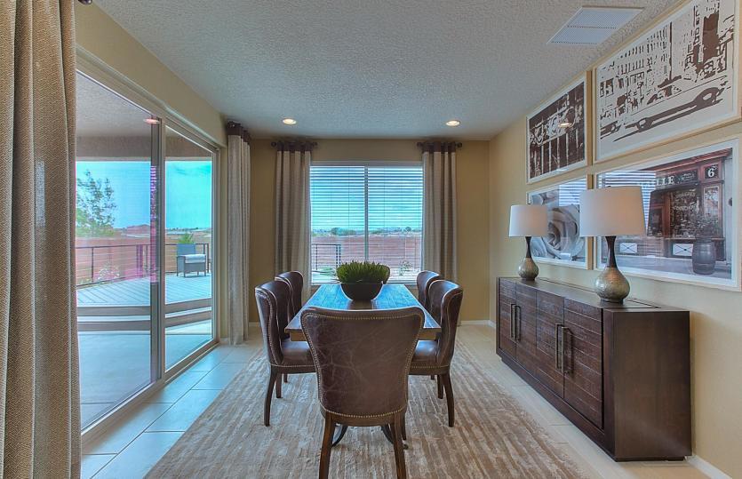 Cafe off the kitchen provides easy access from the kitchen as well as a sliding glass door to the ba