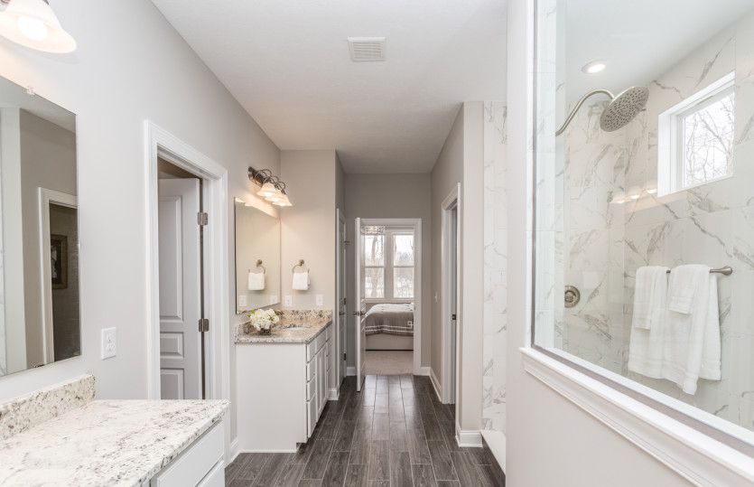 Large Owner's Bath with Two Vanities and Walk-In Shower