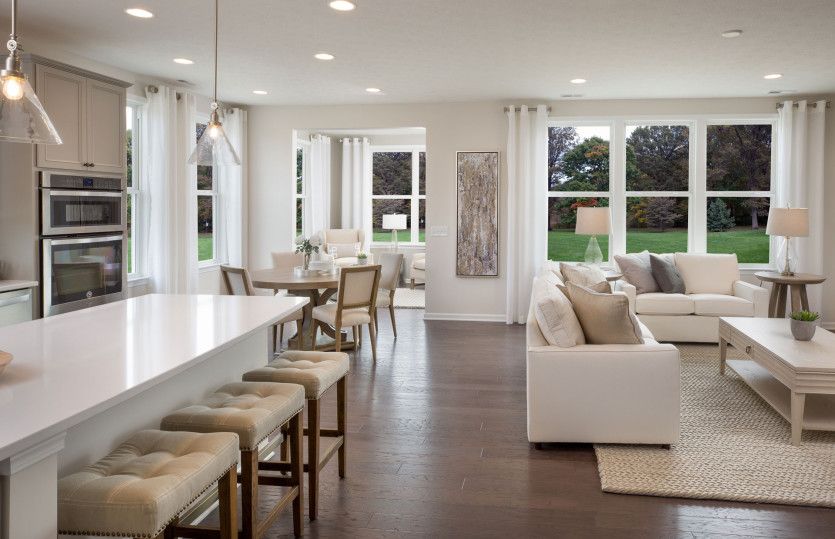 Open Concept Layout Featuring the Dining Room, Gathering Room and Kitchen