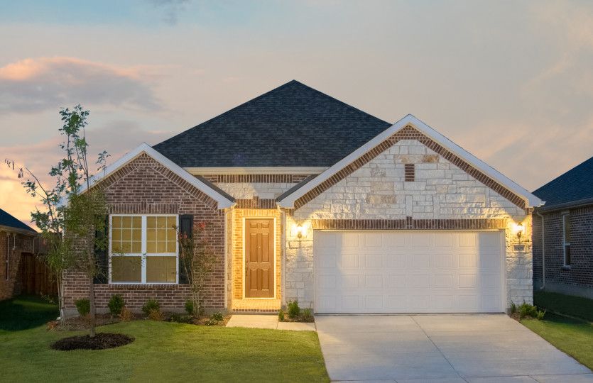 Exterior D with stone and brick, wood shutters, and 2-car garage