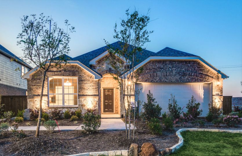 The Mckinney, a one-story home with 2-car garage, shown with Home Exterior C