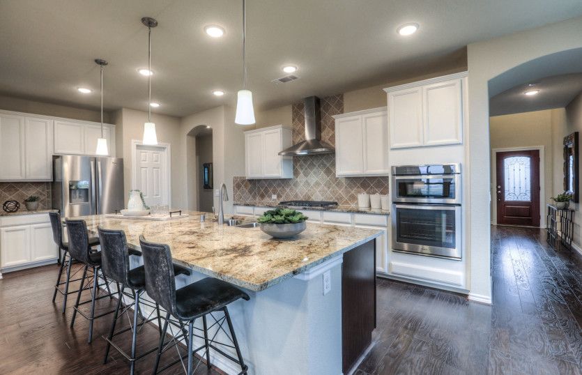 Open concept kitchen with eat-in bartop
