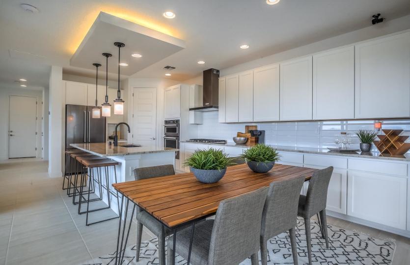 The openness from the kitchen and cafe allow for seamless transitions from room to room while entert