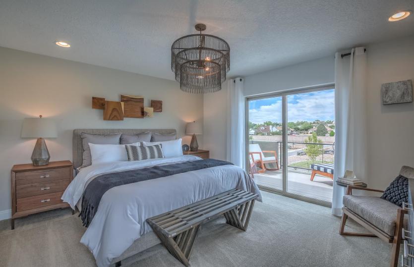The spacious owner's suite includes it's own private bath with the option for a deck and sliding gla
