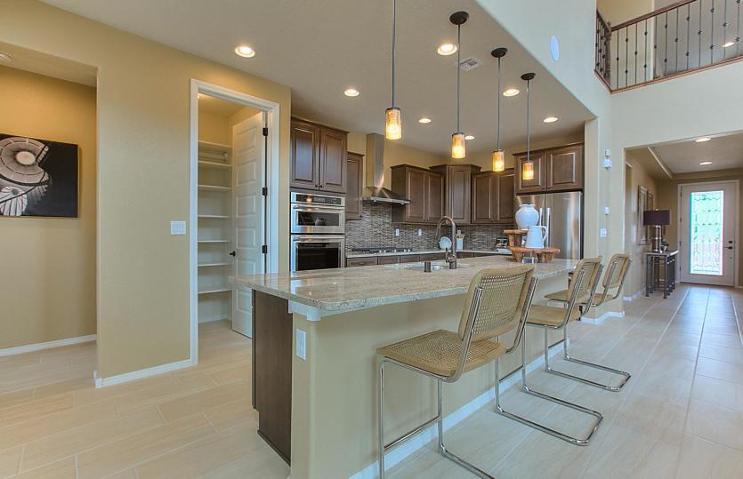 Built-in stainless steel appliances and a large pantry bring functionality and convenience to the Mo