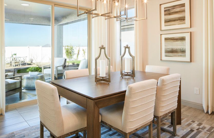 Café area with charming furnishings just off the kitchen