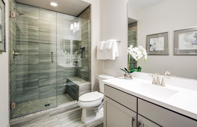 Walk-in shower with seat in secondary bath