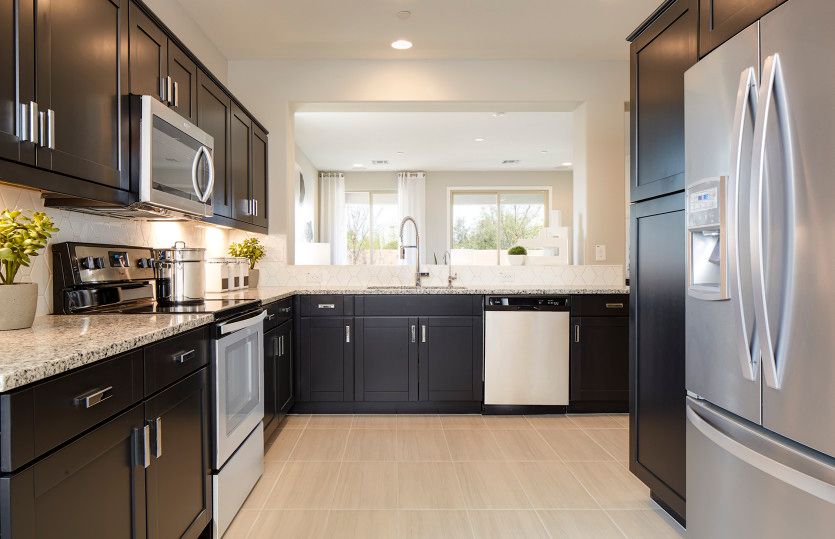 Abundant kitchen cabinet space and counter top space for cooking