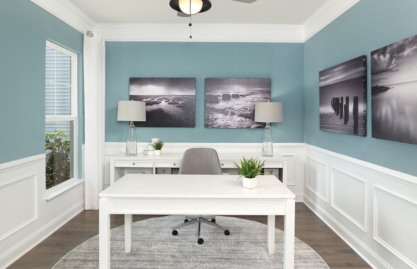 Stay focused in this home office with beautiful trim detail.