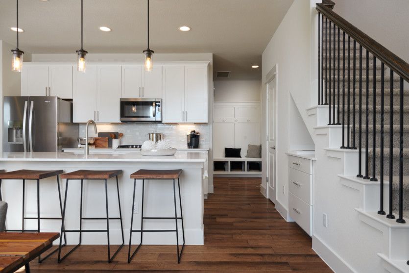 Spacious kitchen with pendant flooring*model representation