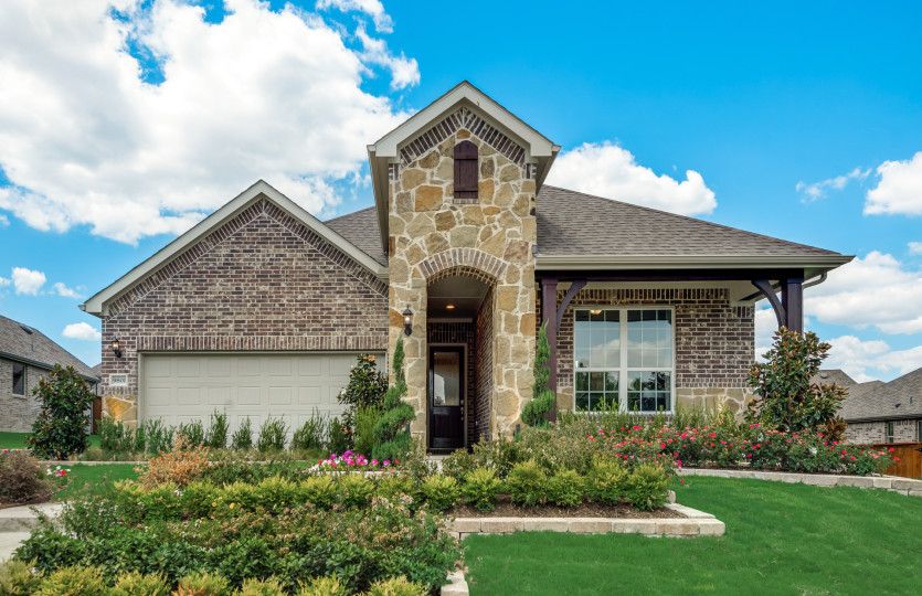 The Arlington, a one-story home with 2-car garage, shown with Home Exterior D