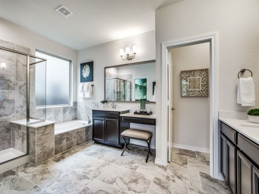 Owner's Private Bathroom with Walk-In Shower and Bathtub
