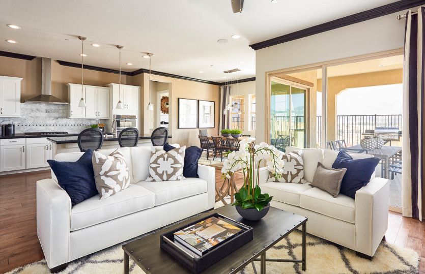 Open gathering room connects the kitchen and café for seamless entertaining.