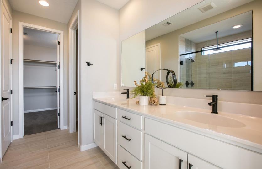 The owner's suite features it's own private bath with dual sinks and a spacious walk-in closet.