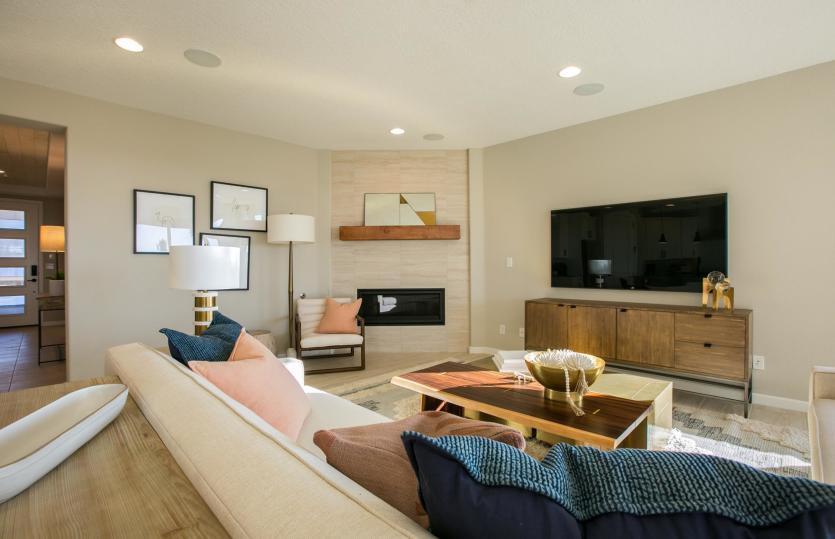 Corner fireplace provides warmth and a cozy ambiance to dinner parties and family gatherings.