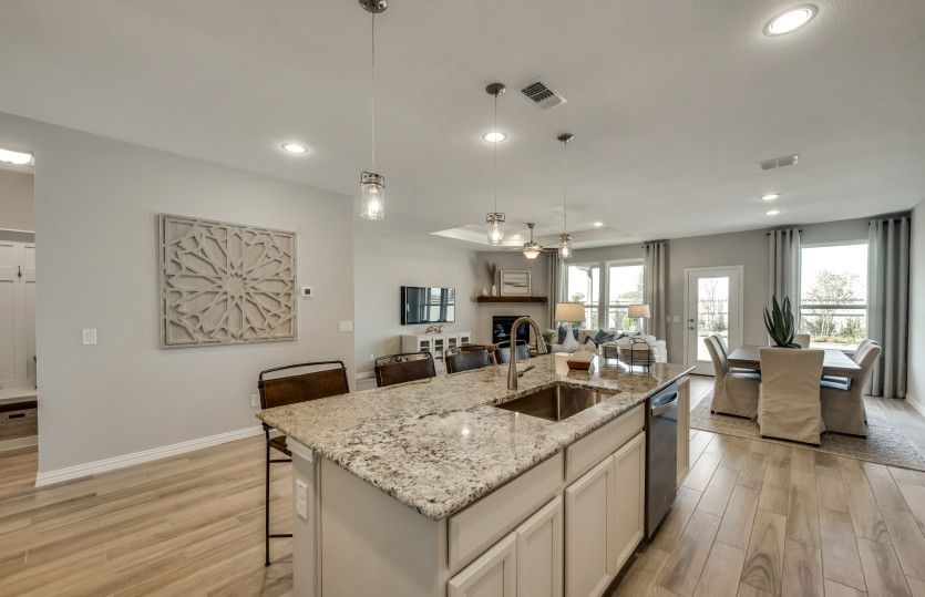 Pendant lighting over large island*model representation