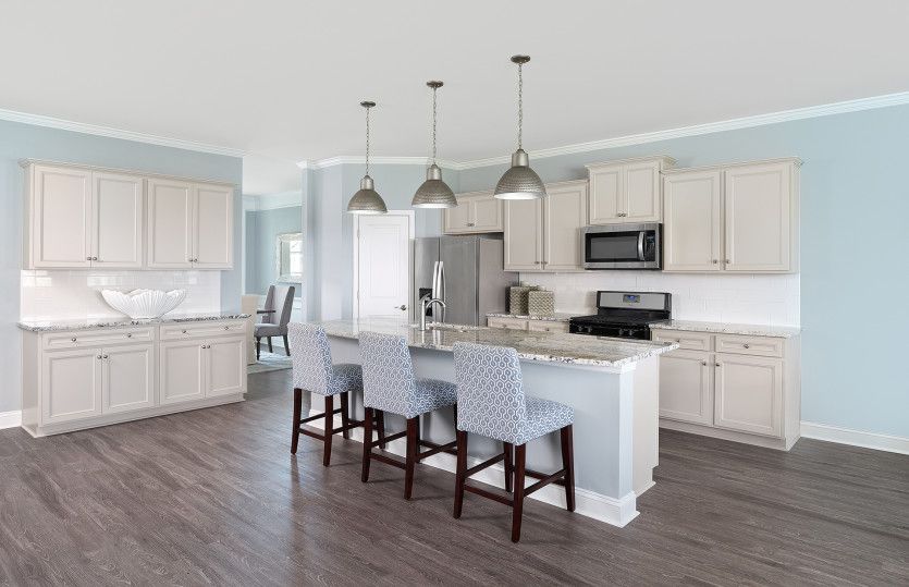 The new home Mitchell showcases a large Kitchen with plenty of cabinet and counter space