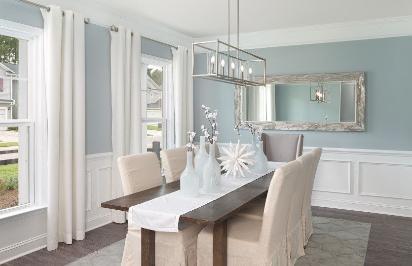 Enjoy a more formal meal in this beautiful Dining Room with elegant trim details