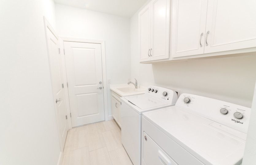 Laundry room with garage access