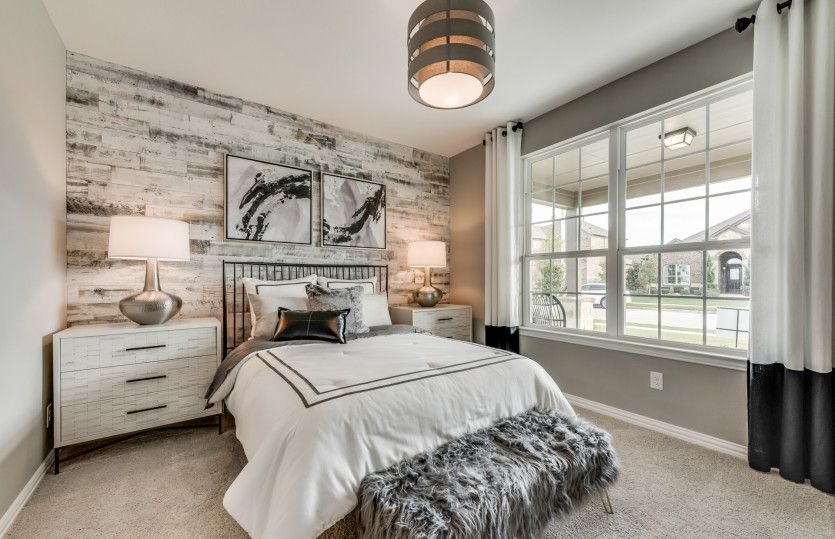 Spacious secondary bedroom *model representation