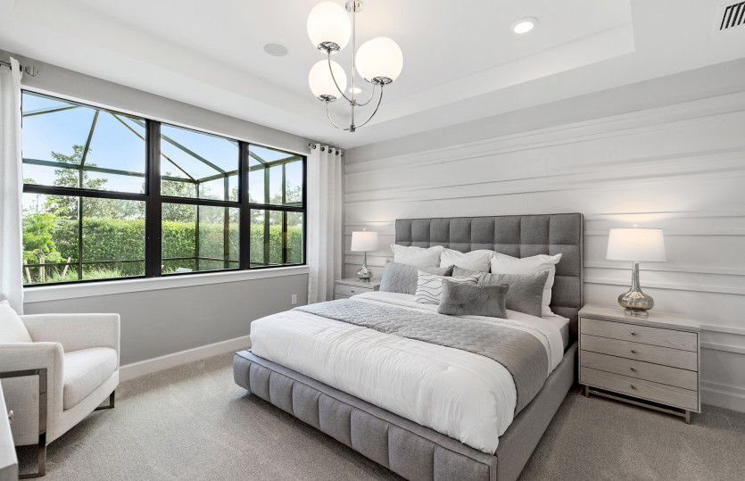 Private owner's suite with elegant tray ceiling