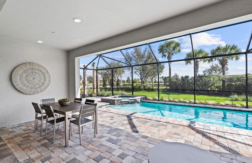 Covered lanai with pool and spa