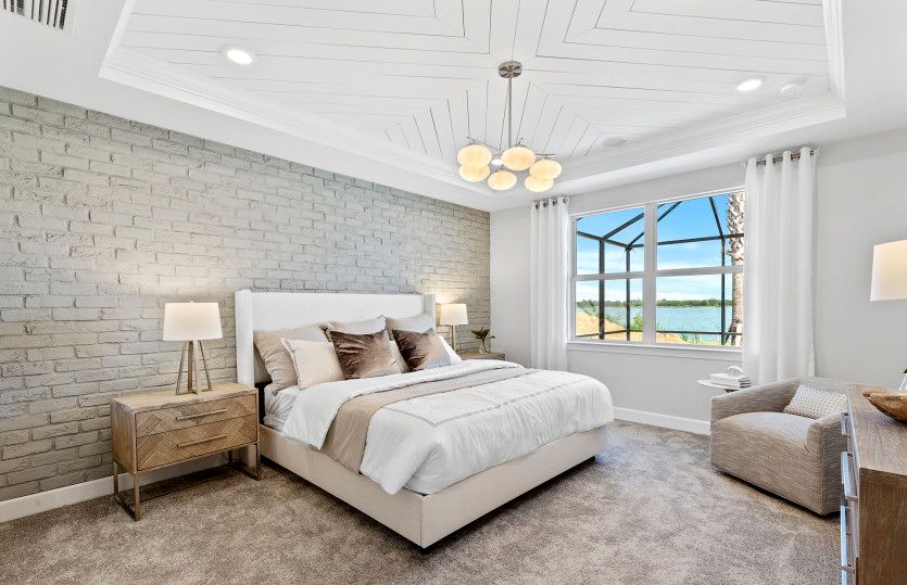 Private owner's suite in the back of home with walk-in closet