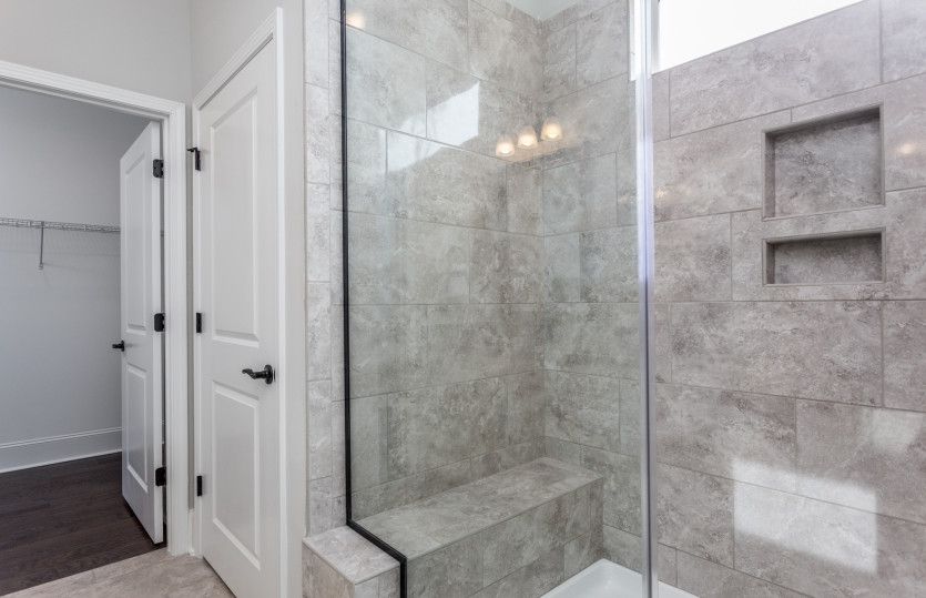 Owners bath with closet and walk-in shower