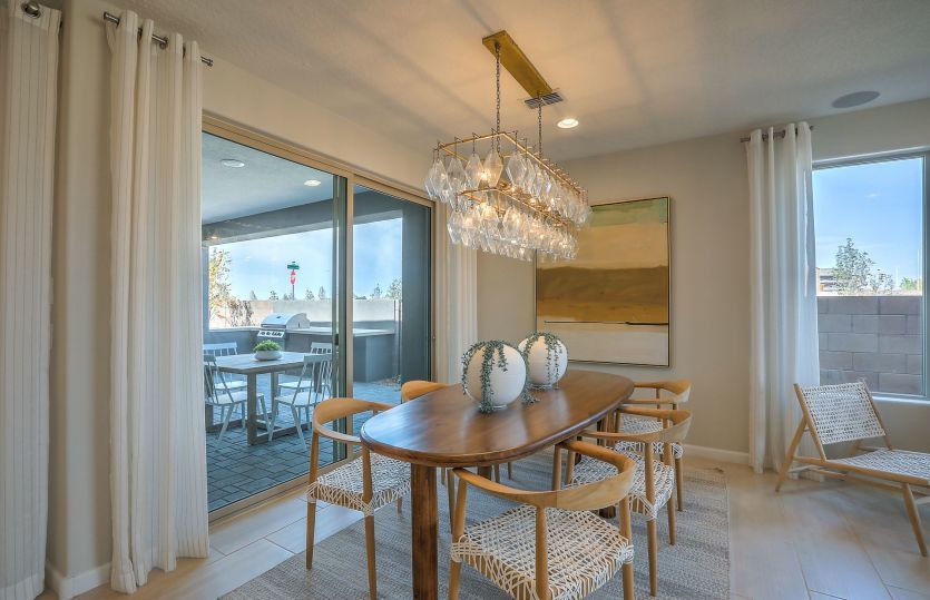 Enjoy family meals in the cafe that offers access to the backyard covered patio and yard for indoor-