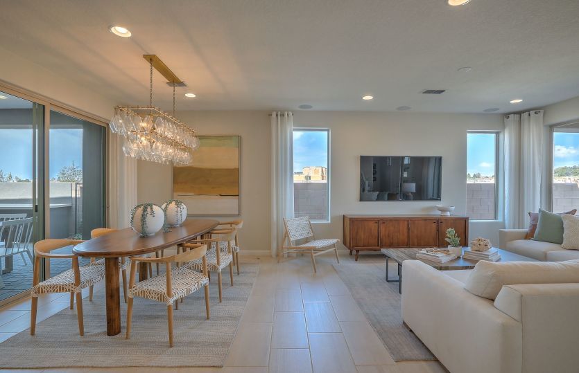 The Senita cafe and gathering room designed with neutral tones of tile flooring and paint detail.