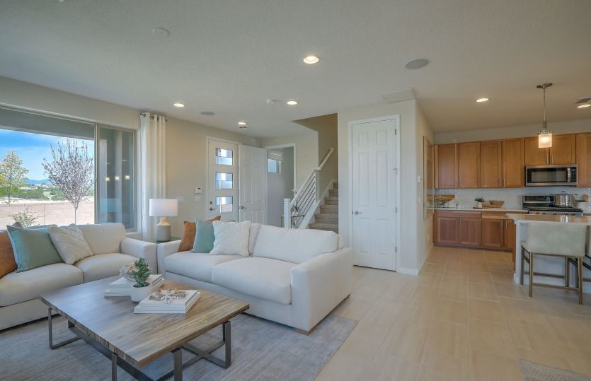 Easily entertain in the Senita home design with an open first floor that includes the kitchen, gathe