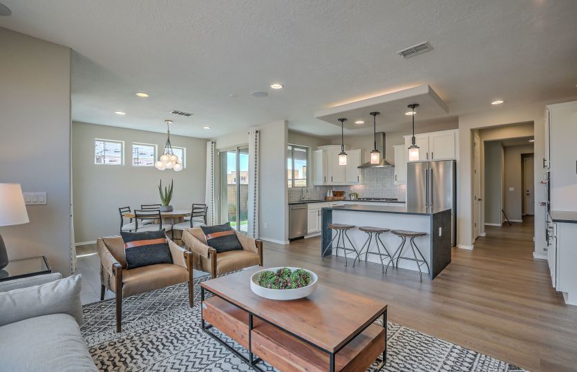 A living space on the first floor is open to the kitchen and cafe, making it a great space for enter